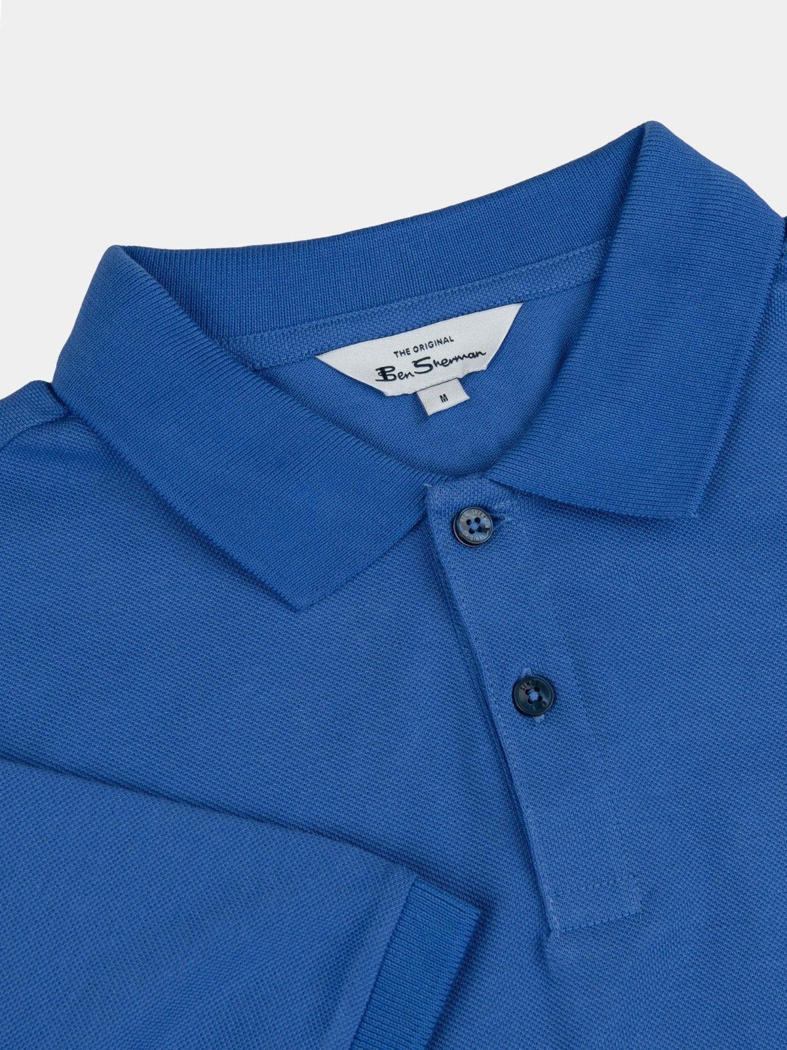 Ben Sherman Ben Polo Scotsdale Blue - close-up of flat knit collar, two-button fastening and piqué cotton fabric detail