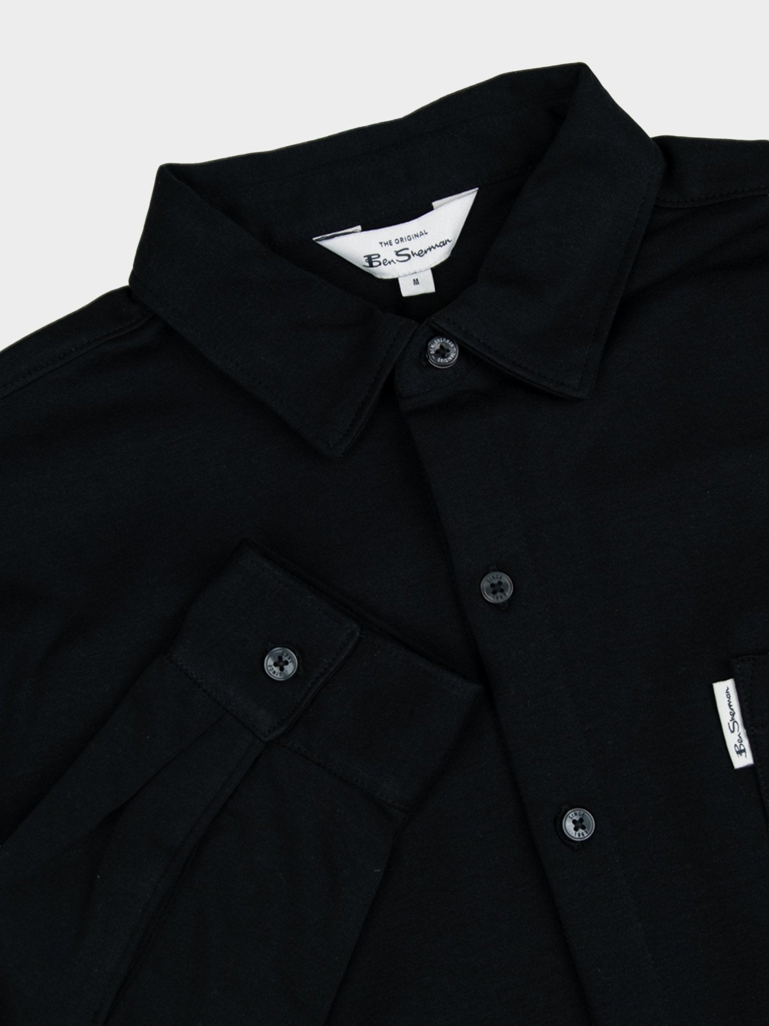 Ben Sherman Double Knit Interlock Long Sleeve Shirt Black - close-up of collar, single chest pocket and Ben Sherman branding