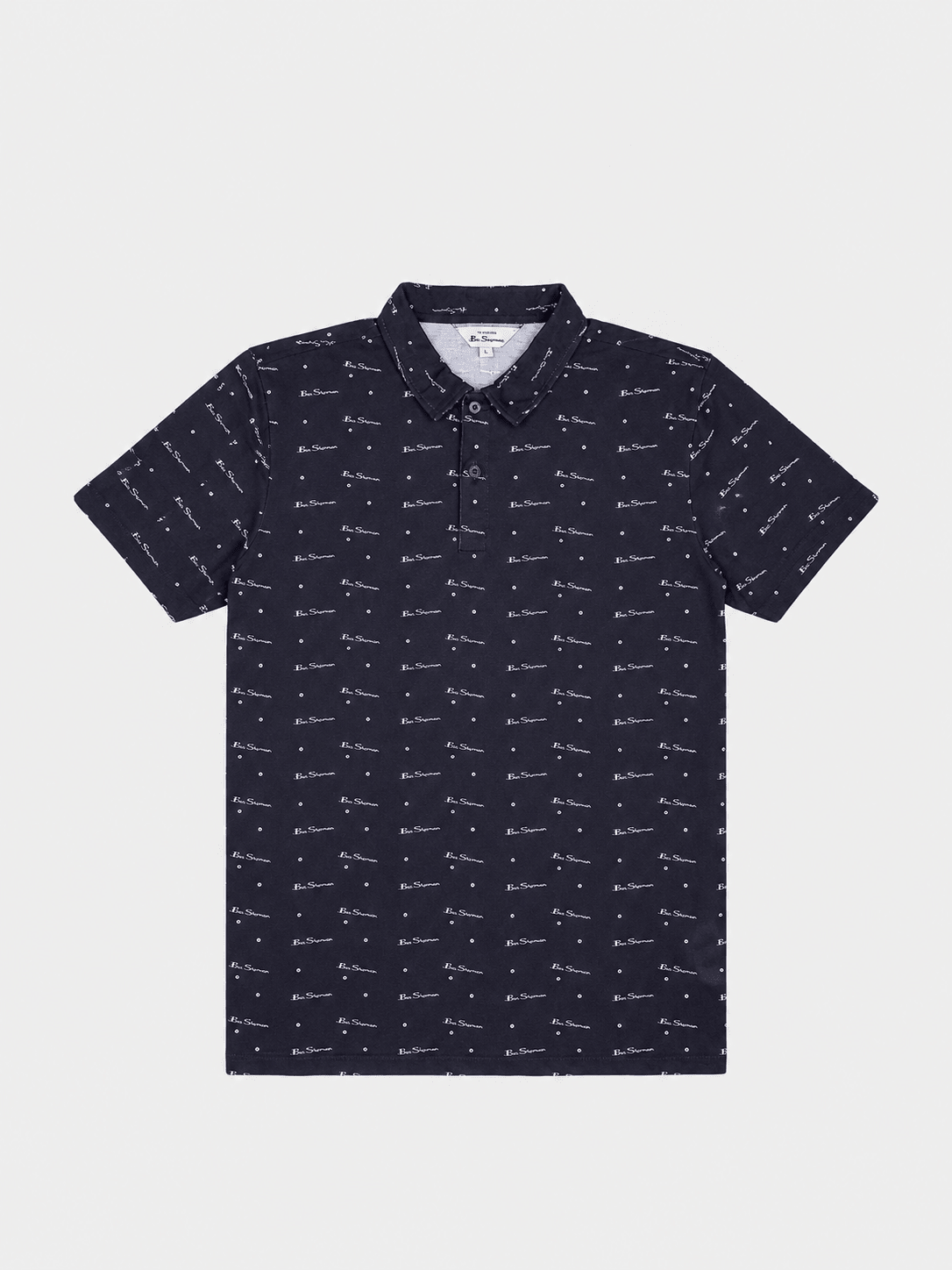 Ben Sherman Target All Over Print Polo in Black – front view, men's short-sleeve polo shirt with all-over logo print