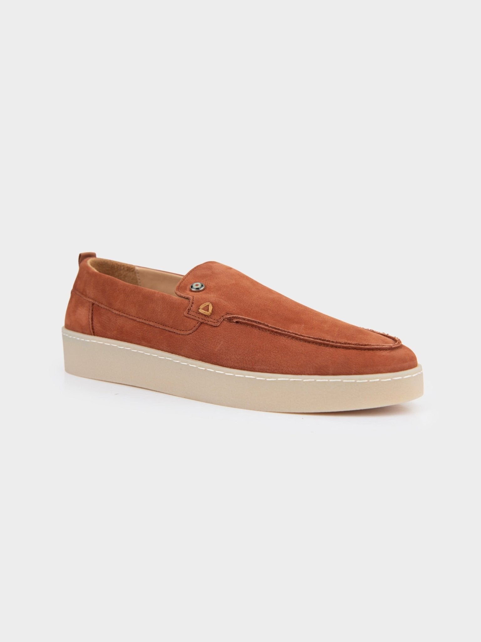 Ben Sherman William Leather Slip On in Rust, three-quarter angle view highlighting the suede leather upper and metal trim detail