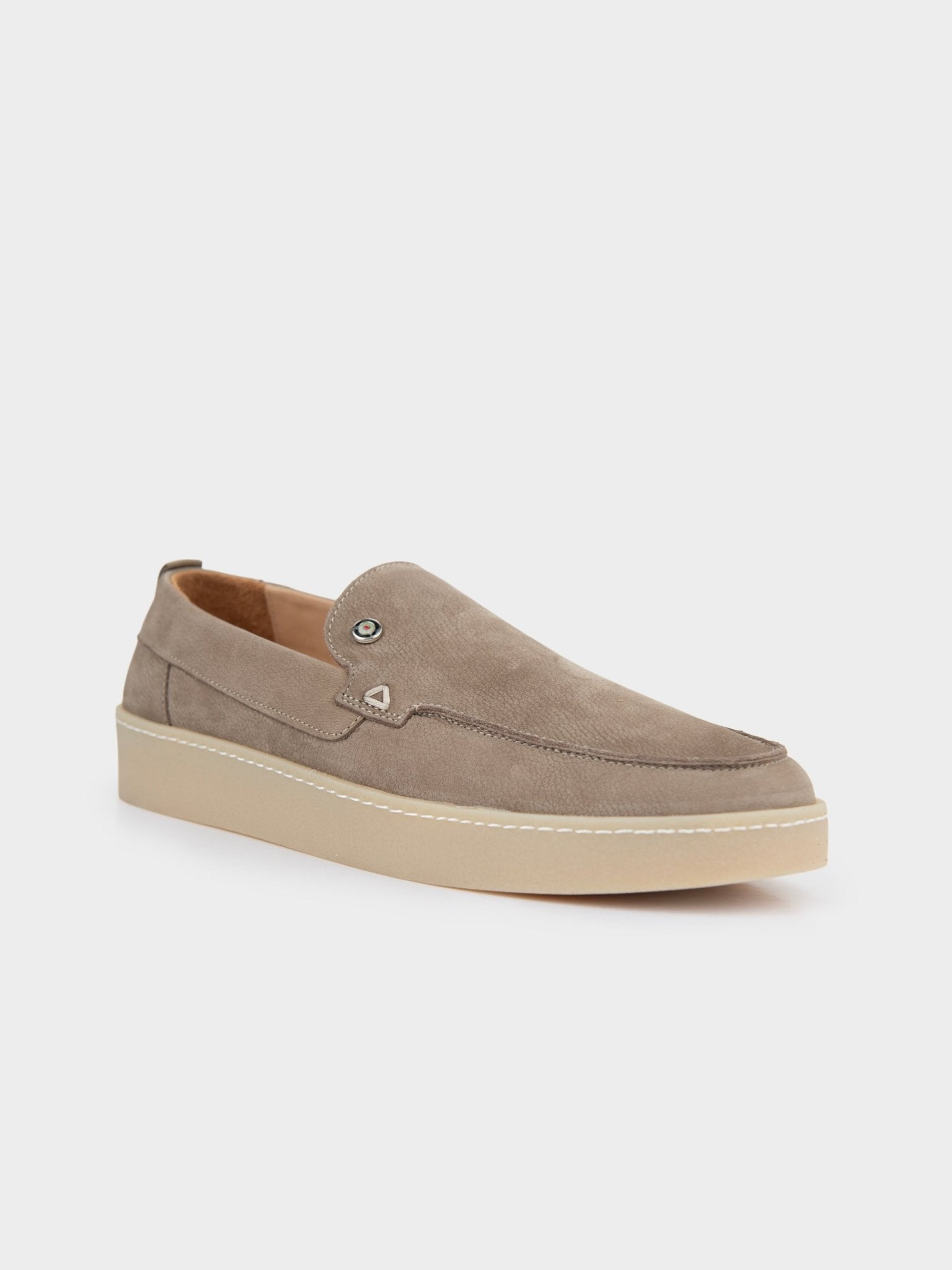 Ben Sherman William Leather Slip On in Taupe, three-quarter angle view highlighting the suede leather upper and metal trim detail