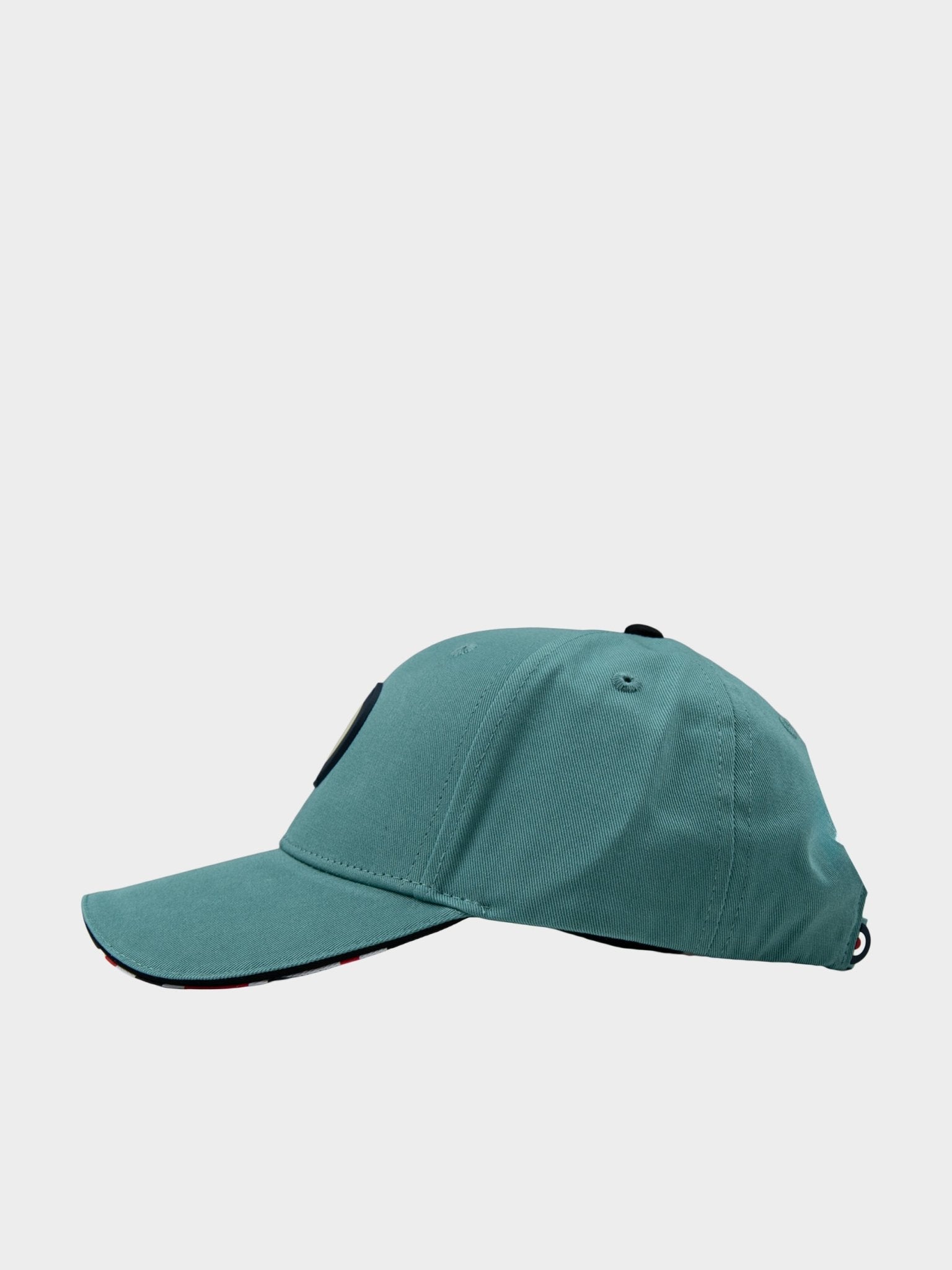 Side view of Ben Sherman Adult Targy Peak Cap in Aqua Teal with Union Jack under-peak lining