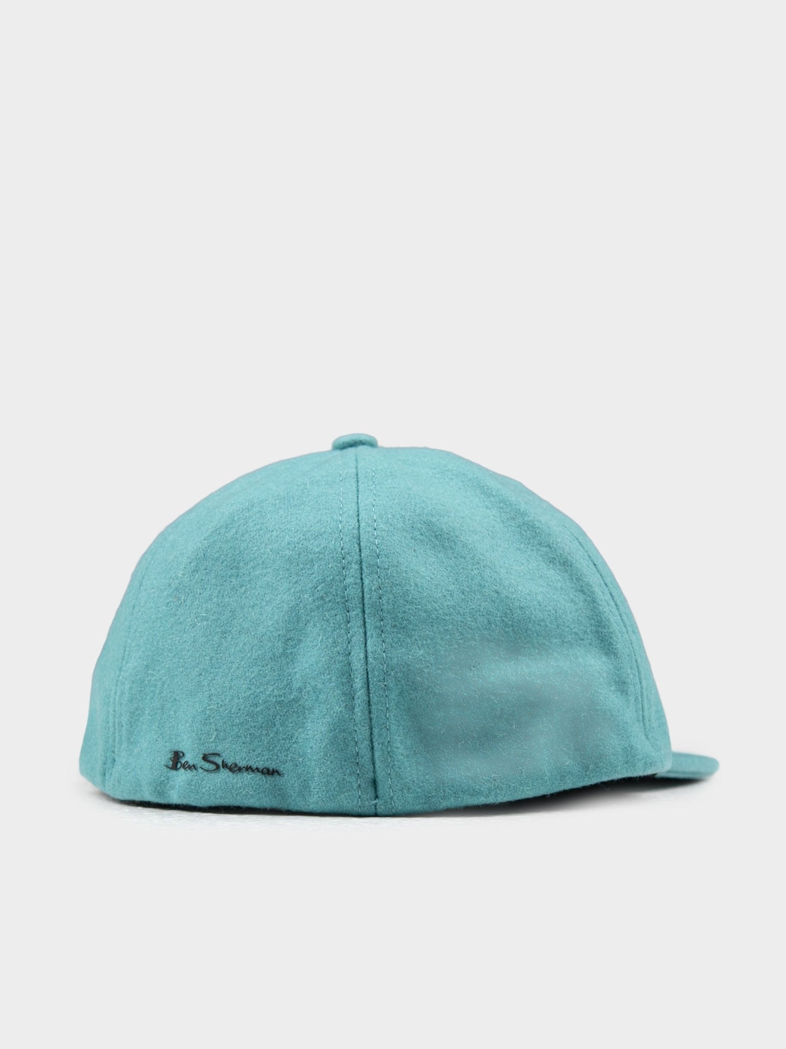 Back view of Ben Sherman Preppy Wool Blend Cap in Aqua Teal featuring hook-and-loop adjustable closure