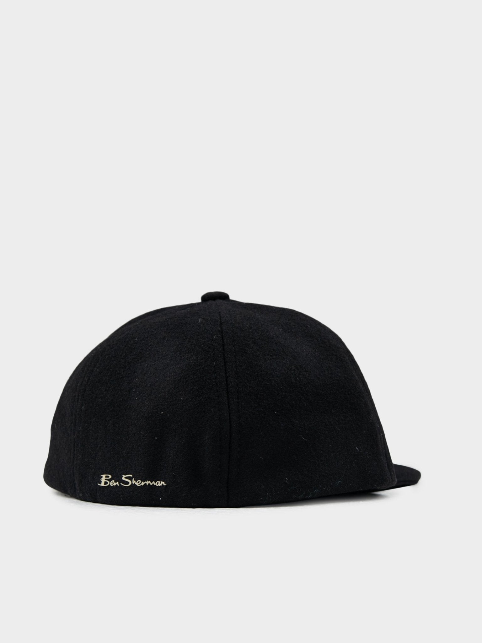 Back view of Ben Sherman Preppy Wool Blend Cap in Black featuring hook-and-loop adjustable closure