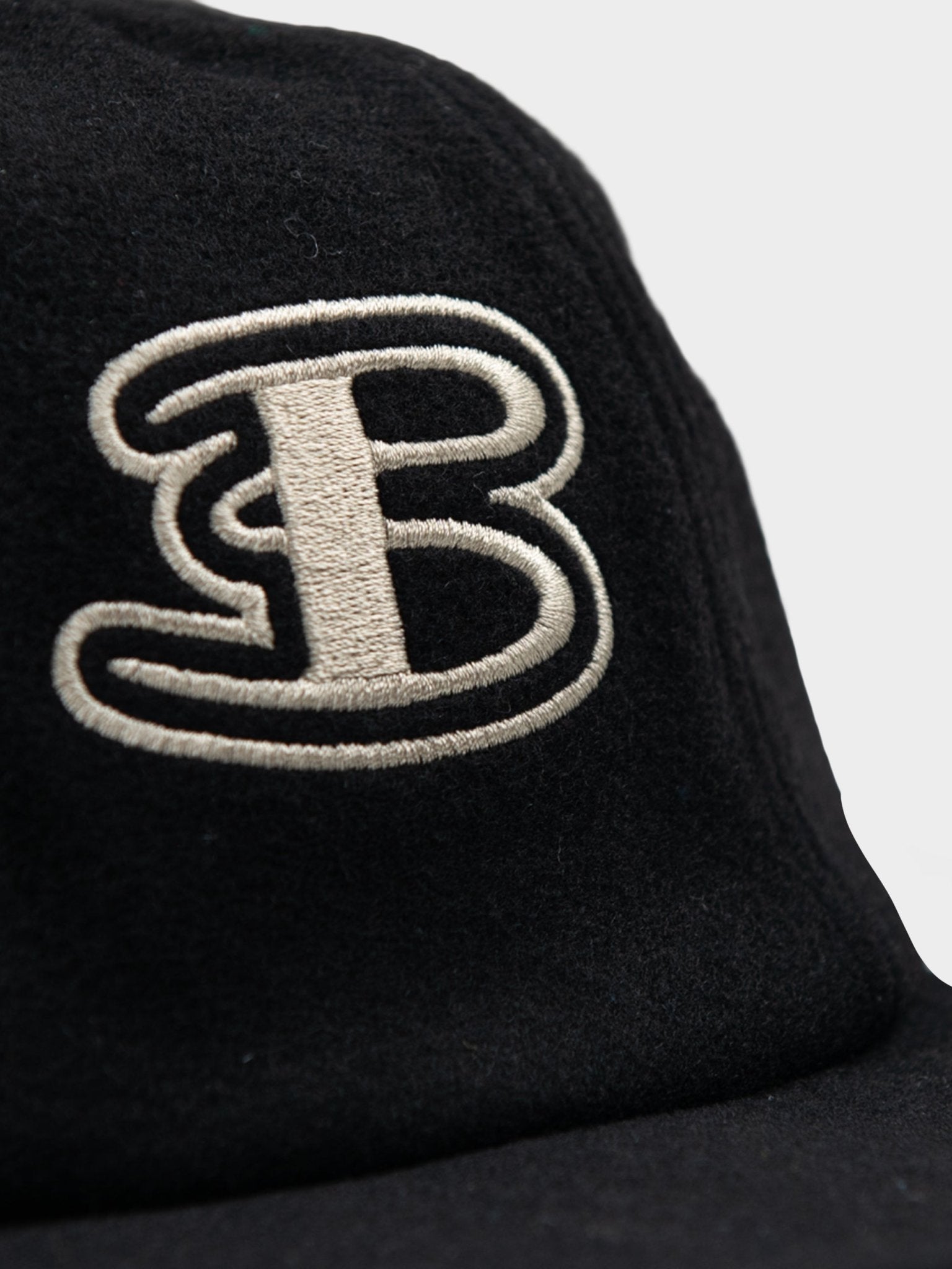 Interior view of Ben Sherman Preppy Wool Blend Cap in Black showing Union Jack lining detail