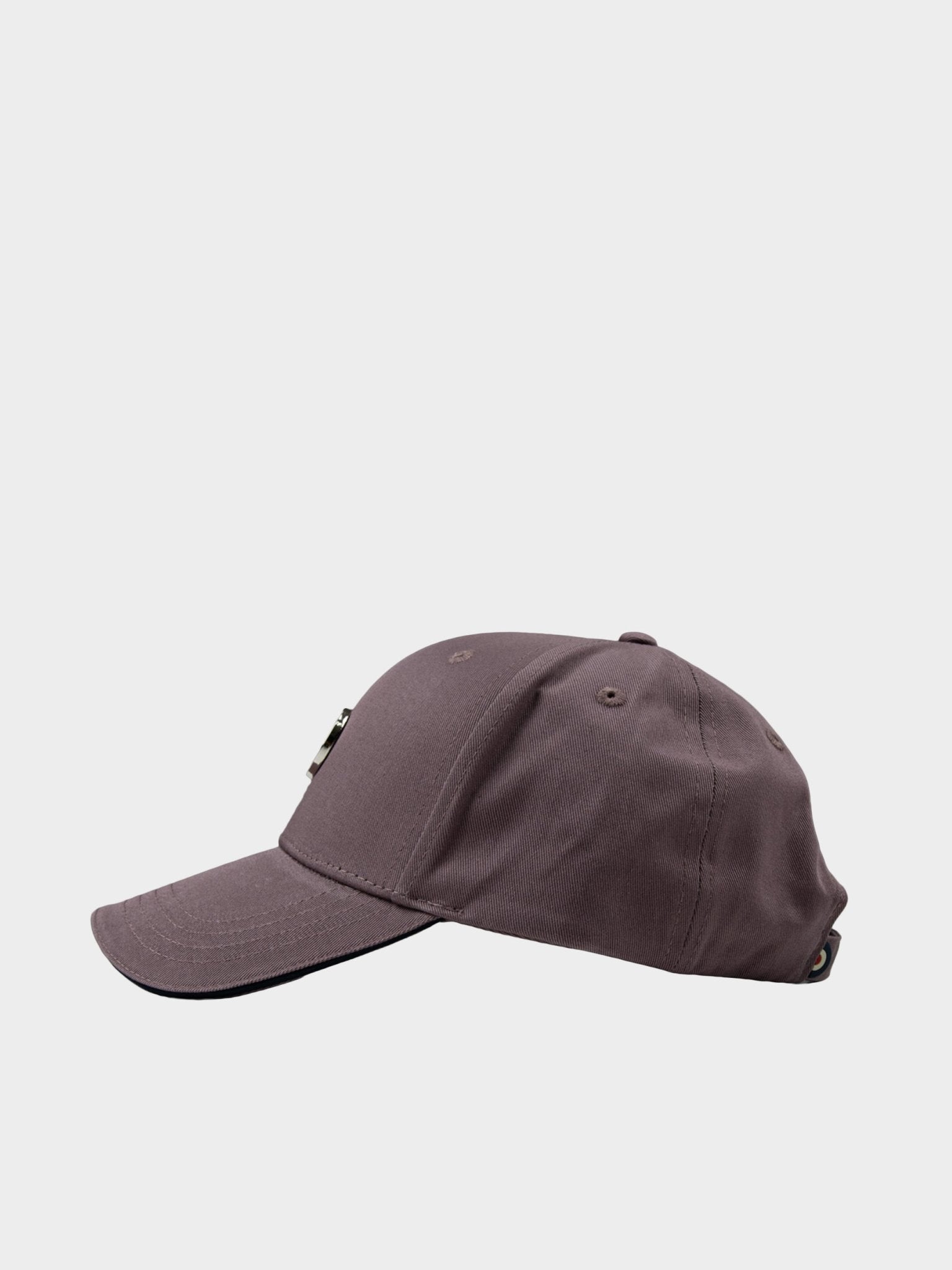 Side view of Ben Sherman Metal Target Badge Cap in Cocoa Powder showing structured crown and curved visor