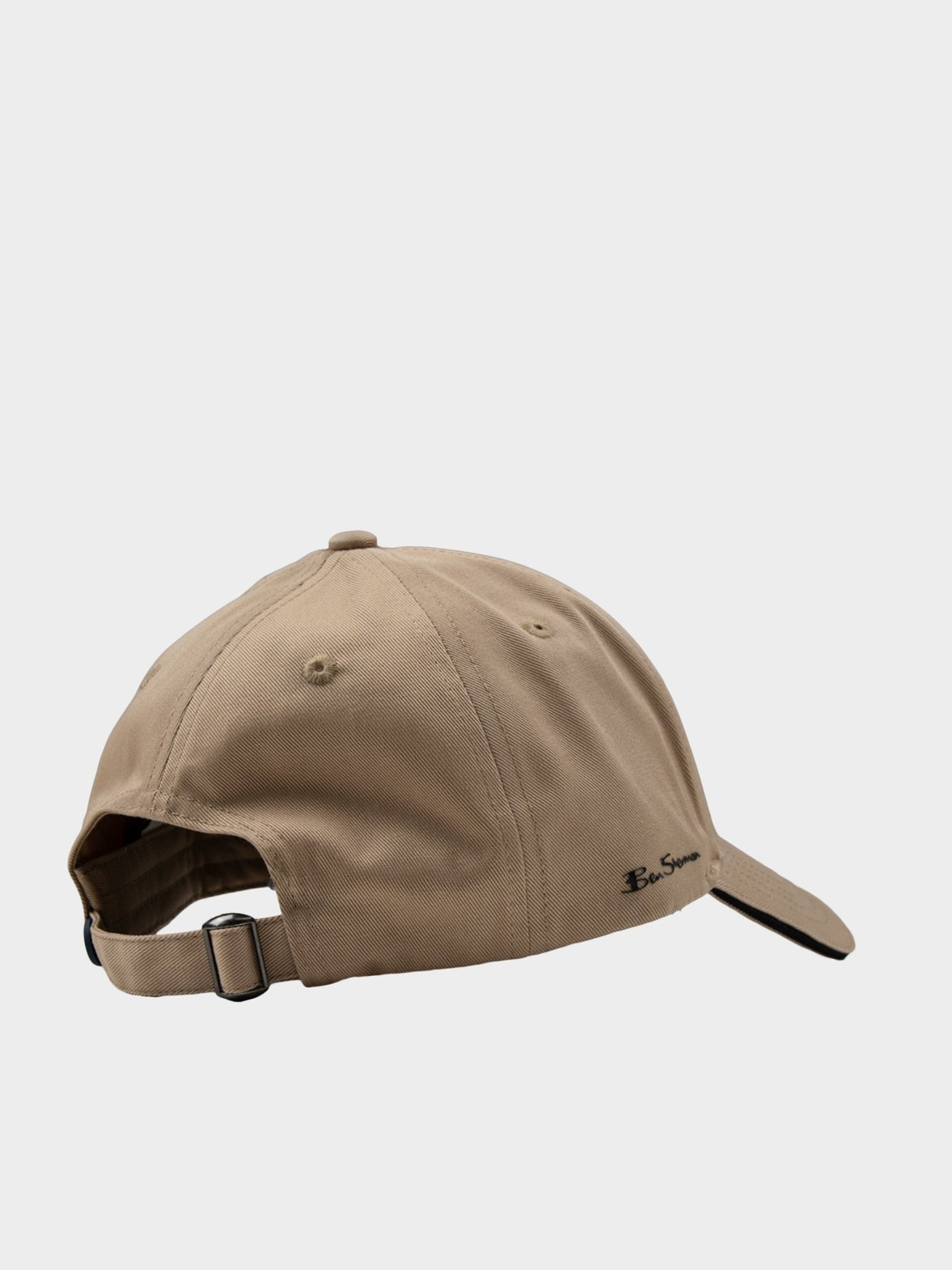 Back view of Ben Sherman Metal Target Badge Cap in Cornstalk featuring adjustable strap closure