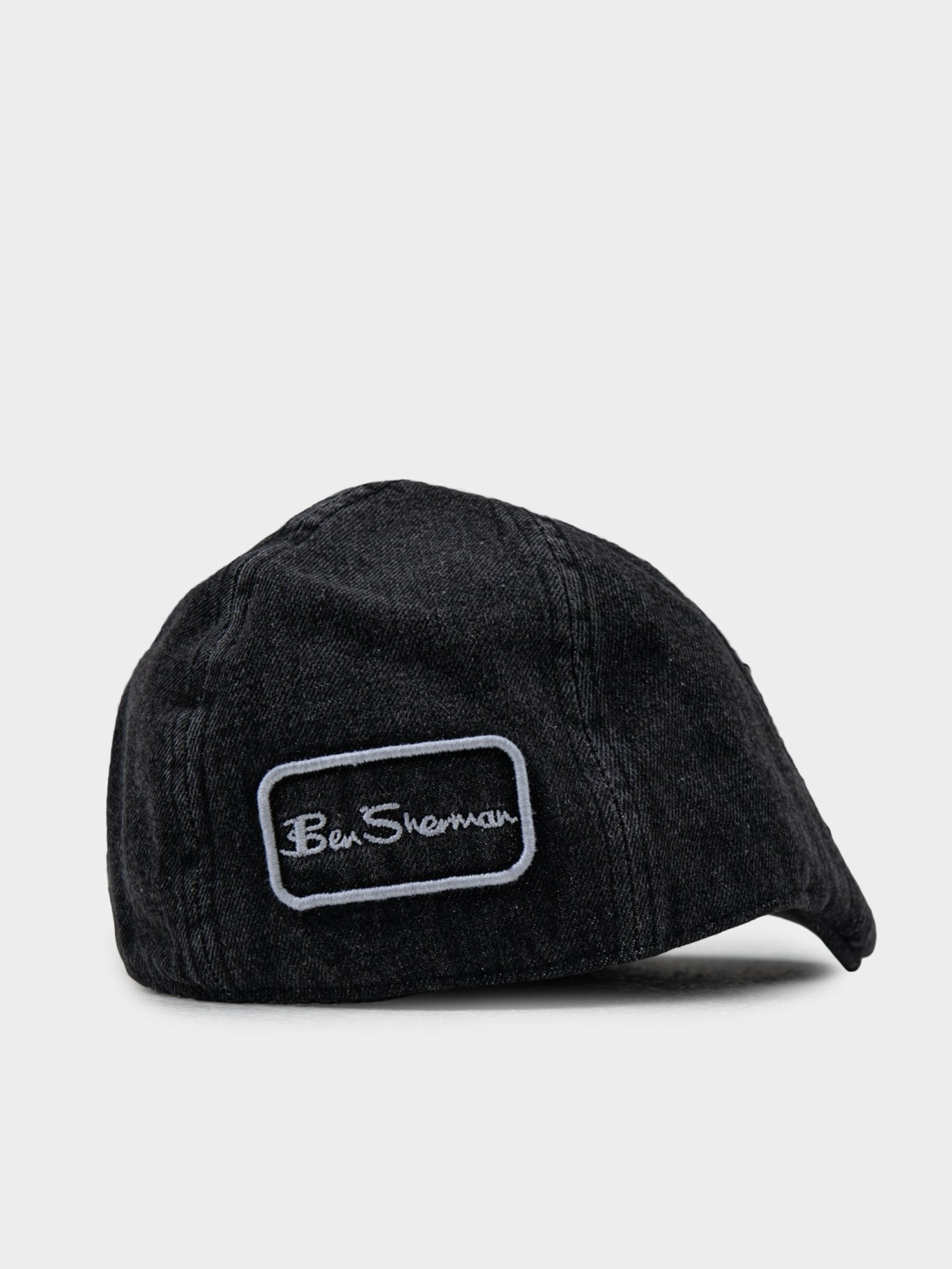 Back view of Ben Sherman Denim Dixie Cap in Black with embroidered Ben Sherman logo pClose-up of embroidered Ben Sherman signature logo on Denim Dixie Cap in Blackatch