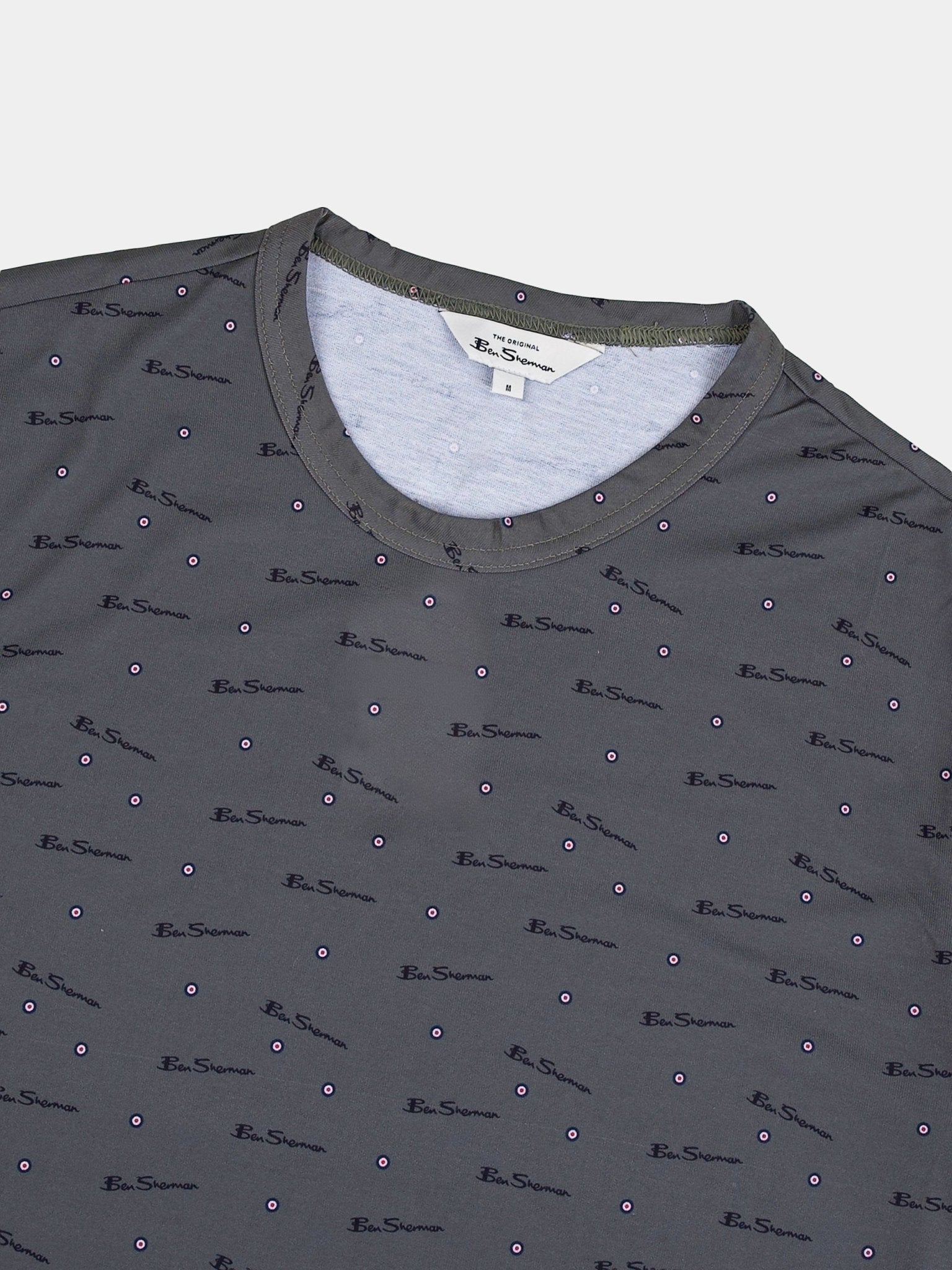 Ben Sherman All Over Print T-Shirt in Olive - close-up detail of logo print and crew neckline