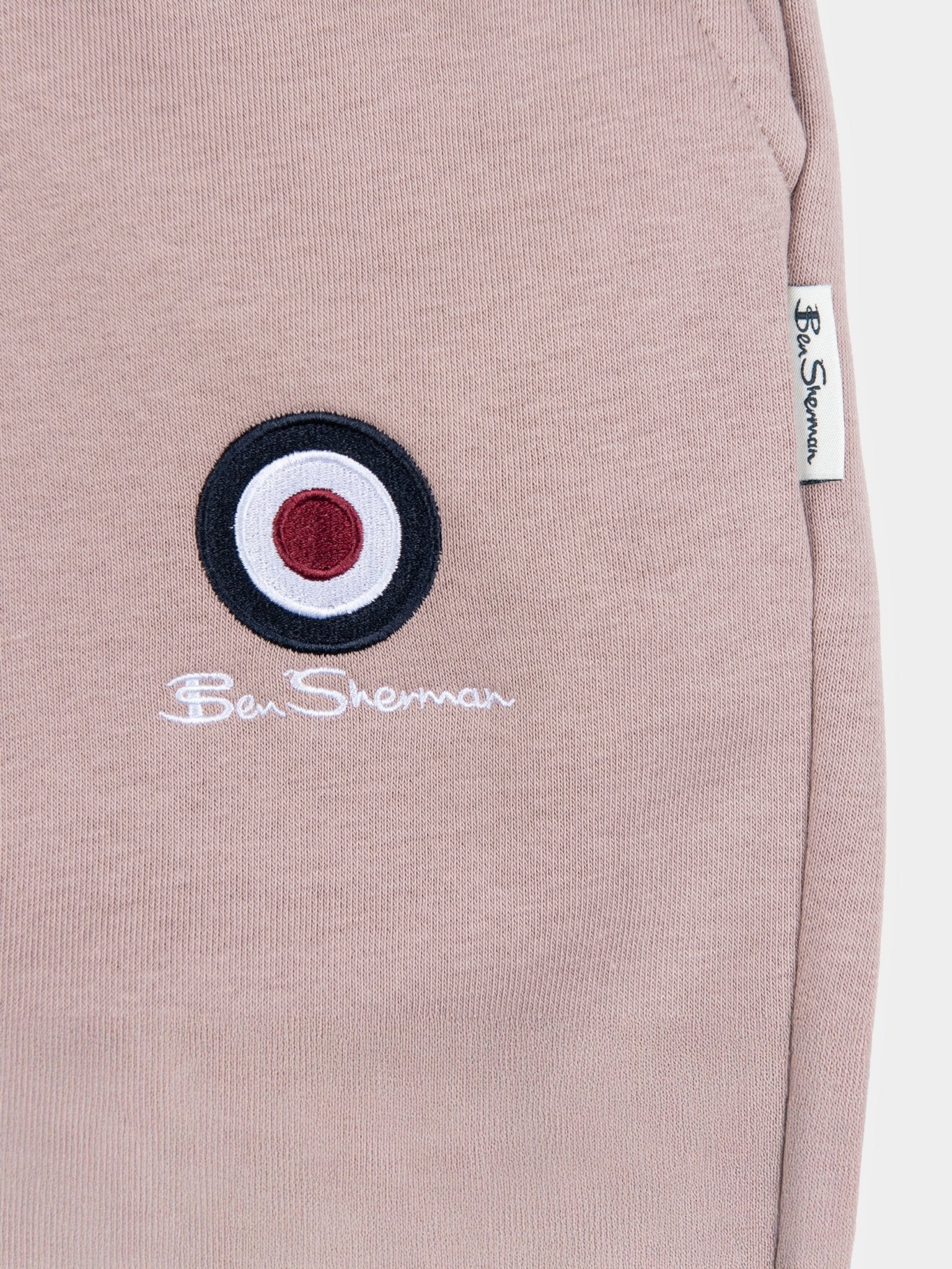 Ben Sherman Target Jogger Shorts Pale Mauve – close-up of iconic target emblem and drawcord waistband detail