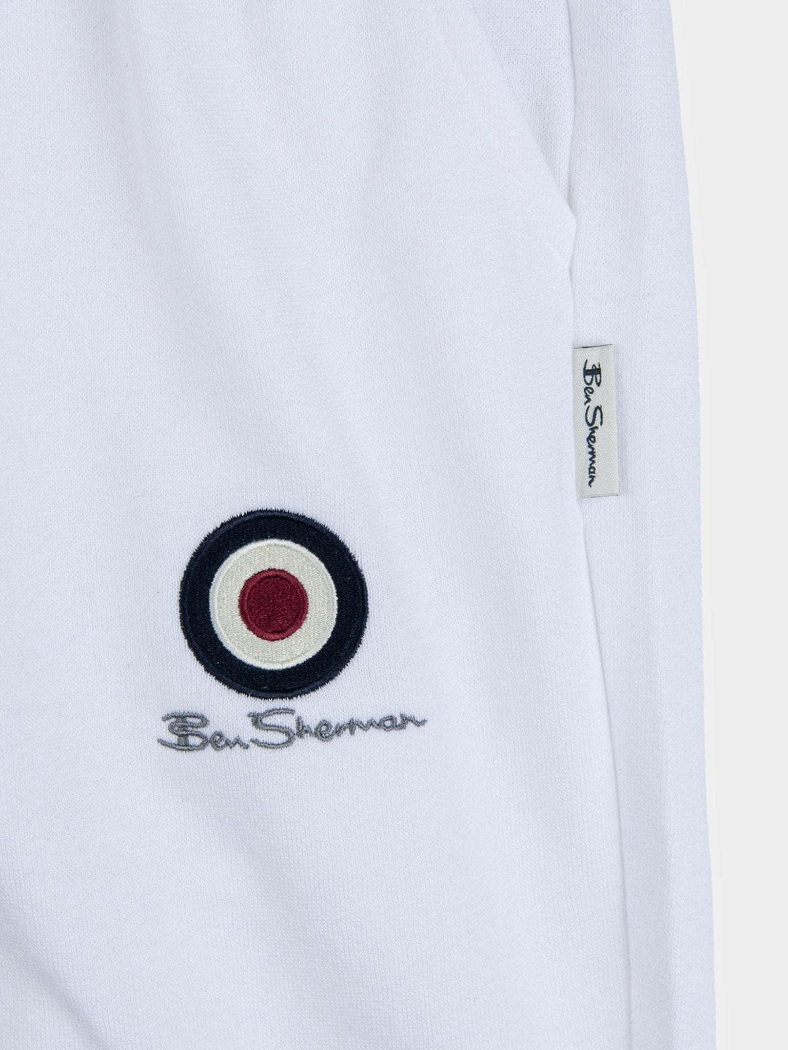 Ben Sherman Target Jogger Shorts White – close-up of iconic target emblem and drawcord waistband detail