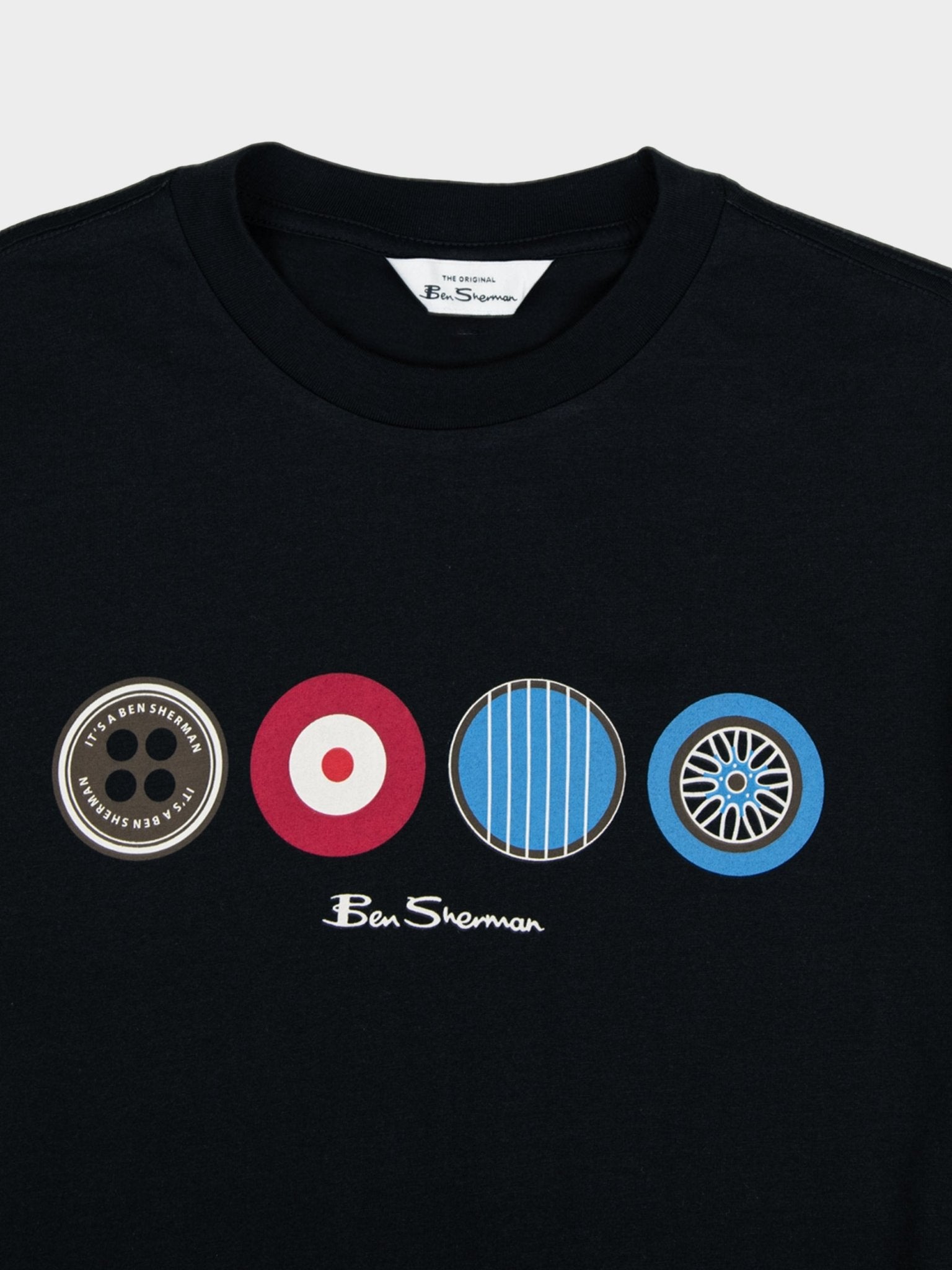 Close-up of Ben Sherman It's a Ben Sherman Tee Black – detail of mod-heritage graphic print featuring British-inspired design icons
