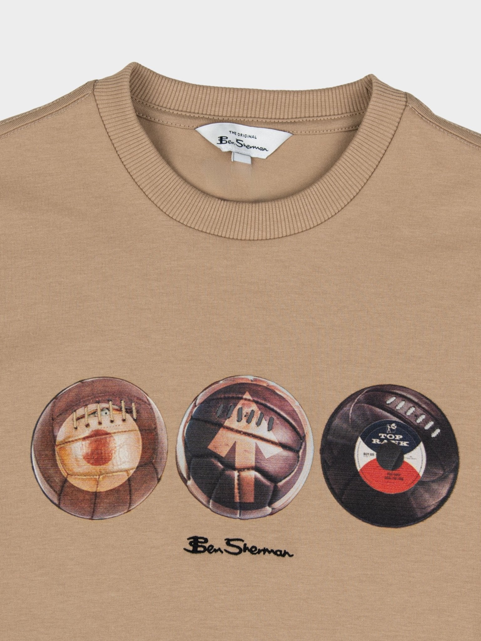 Close-up of Ben Sherman 3 Ball Tee chest graphic in Corn Stalk – three mod-inspired ball motifs with Ben Sherman branding on corn stalk cotton fabric